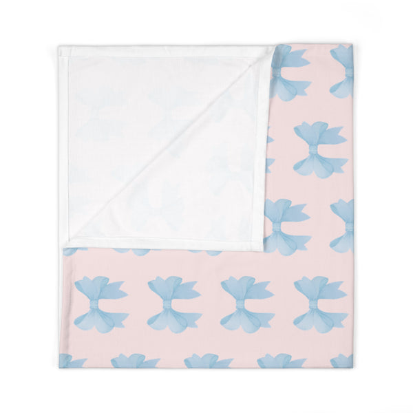 Baby Swaddle Blanket in watercolor blue bow print pattern - blush pink background